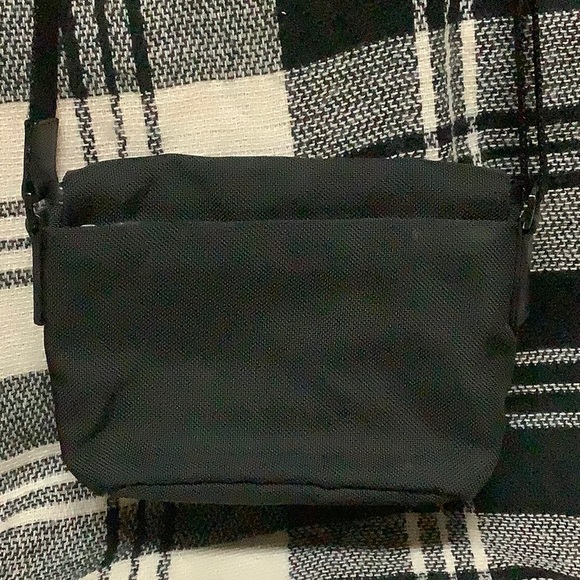 Tumi black leather & nylon crossbody bag - Picture 2 of 11